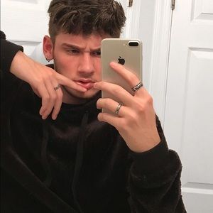 Black faux fur sweatshirt.